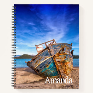 Altes blaues Boot am Meer Notizblock