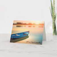 Altes blaues Ruderboot auf einem See Mitgefühl