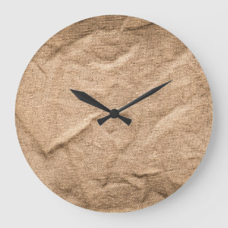 Altes braunes Tuch: texturierter Hintergrund. Große Wanduhr