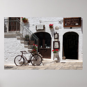 Altes Fahrrad und Ladenfassade in Apulien Poster
