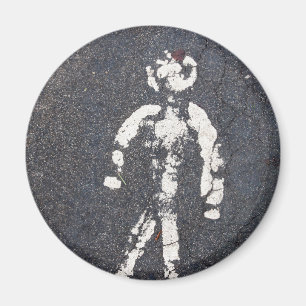 Altes Fußgängersymbol auf einer rissigen Straße Magnet