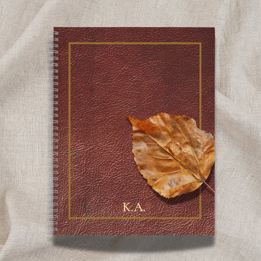 Altes Leder-Look-Journal mit Herbstblatt Notizblock