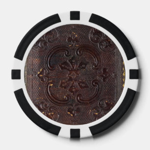 Altes Lederbuch fällt herunter Pokerchips