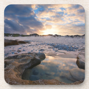 Am Sonnenuntergang in einer Pfütze Getränkeuntersetzer