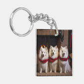 American Eskimo am Feuerplatz Weihnachten Schlüsselanhänger (Vorderseite links)