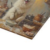 American Eskimo Dog Cooking in Kitchen Schneidebrett (Ecke)