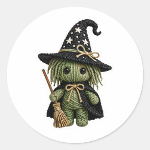 Amigurumi-Stil gestrickte grüne Hexe mit Besen Runder Aufkleber