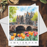 Amsterdam Canal Tulips in Spring Watercolor Travel Postkarte<br><div class="desc">Erleben Sie den Charme Amsterdams mit dieser Aquarellpostkarte. Mit einem malerischen Kanal,  Tulips,  historischen holländischen Häusern und sanften Frühlingshöfen erweckt diese Postkarte das traumhafte Wesen der Niederlande zum Leben. Ideal für Reisende,  Kunstliebhaber oder als Geschenk für Amsterdamer Liebhaber.</div>