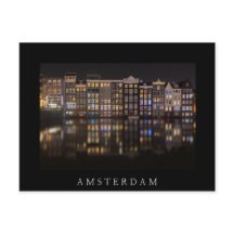 Amsterdam-Häuser mit bunten Lichtern in der Nacht