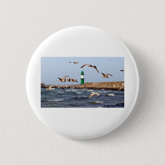 An der Mole in Warnemünde an der Ostsee Button