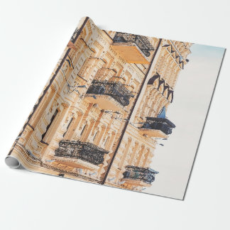 An old yellow house with wrought-iron balconies. f geschenkpapier