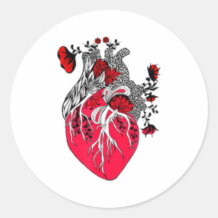 Anatomisches Herz, das rote Blumen zum Valentinsta Runder Aufkleber