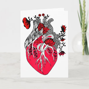 Anatomisches Herz mit blühenden roten Blumen zum V Karte