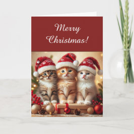Anbetungswürdige drei süße Kätzchen in Weihnachtsm Feiertagskarte