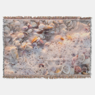Anbrandende Wellen und Muscheln auf Sanibel Island Decke