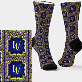 Anfängliche Aufnahme in Gold auf dunkelblauen Abst Socken