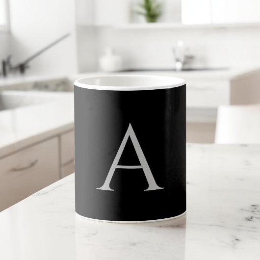 Anfängliches Monogramm mit weißem schwarzem Namen  Kaffeetasse