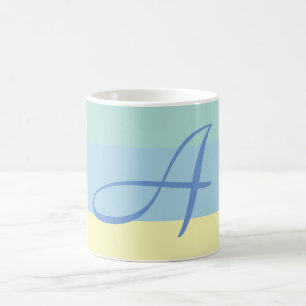 Anfangsbuchstaben des blauen gelben Farbblocks Kaffeetasse