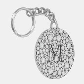 Angeflochtene Diamantbeizen, schwarz, weiß Schlüsselanhänger (Vorderseite links)