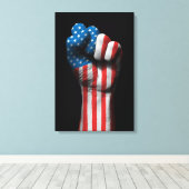 Angestiftete Faust mit amerikanischer Flagge Leinwanddruck (Insitu (Holzboden))