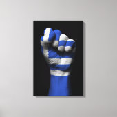 Angestiftete Faust mit griechischer Flagge Leinwanddruck (Vorderseite)