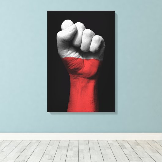 Angestiftete Faust mit polnischer Flagge Leinwanddruck (Insitu (Holzboden))
