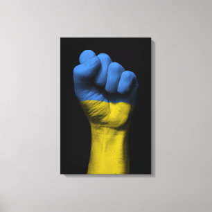 Angestiftete Faust mit ukrainischer Flagge Leinwanddruck