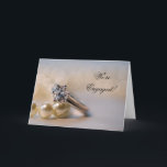 Ankündigung der Diamantring- und Perlring-Verlobun<br><div class="desc">He proposed and you accepted! Now, announce your engagement to be married in style! Customize the elegant Diamond Ring and Pearls Verpflichtungserklärung Greeting Card with your own personal note or message inside. This classiy custom we're engagements ennouncement feature a close up photograph of a diamond ring and white pearl necklace....</div>