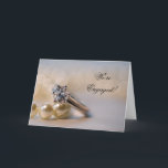 Ankündigung der Diamantring- und Perlring-Verlobun<br><div class="desc">He proposed and you accepted! Now, announce your engagement to be married in style! Customize the elegant Diamond Ring and Pearls Verpflichtungserklärung Greeting Card with your own personal note or message inside. This classiy custom we're engagements ennouncement feature a close up photograph of a diamond ring and white pearl necklace....</div>