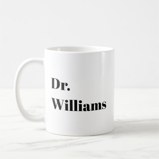 Anpassbar "Es ist ein Dr." PHD-Abschluss-Geschenk Kaffeetasse (Links)