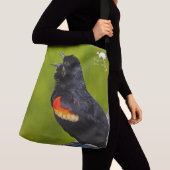 Anruf vom wilden tragetaschen mit langen trägern (Von Nahem)