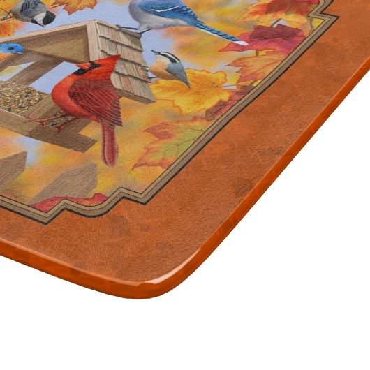 Ansammlung der Vogelzuführung Herbstorange Schneidebrett (Ecke)