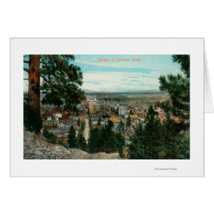 Ansicht der Stadt durch die Bäume