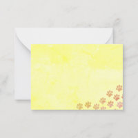 Anstrichene Welpenpaw druckt altes Papier