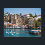 Antalya, Türkei: Altstadt Marina Postkarte<br><div class="desc">Der alte Hafen von Antalya ist einer der meist besuchten Bereiche der Stadt. Im Hintergrund des Fotos kann man das Seljuk Minaret stehend über den Felsen sehen, die den Hafen umgeben und mit Touristenbooten gefüllt sind. Diese Postkarte von Antalya ist vollständig anpassbar.</div>