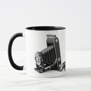 antike Balgenkamera mit Filmrolle Tasse
