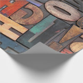 Antike Buchstabenblöcke mit Farbtinte Geschenkpapier (Ecke)