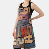 Antike Buchstabenblöcke mit Farbtinte Schürze (InSitu)