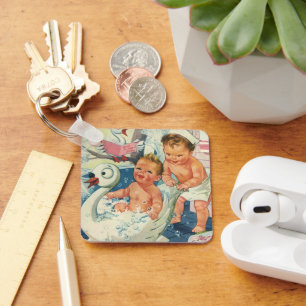 Antike Kinder spielen mit Seifenblasen in einer Sc Schlüsselanhänger