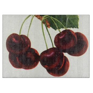 Antike Obstprodukte, reife Kirschen von einem Baum Schneidebrett