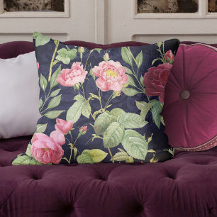Antike Rosen auf einem dunkelblauen Samt-Design Kissen
