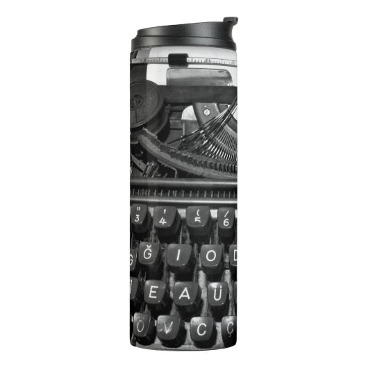 Antike Schreibmaschine, die im Korrespondenzverkeh Thermosbecher (Nach links gedreht)