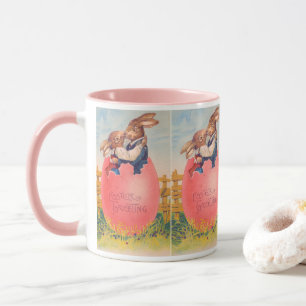 Antike viktorianische Ostergrüße Zwei Hasen küssen Tasse