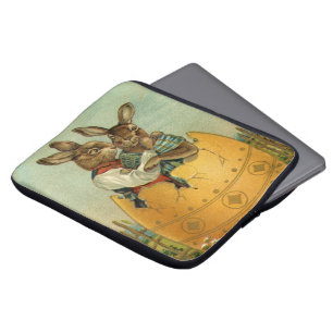 Antike viktorianische Osterhasen in einem goldenen Laptopschutzhülle