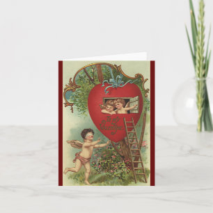 Antike viktorianische Valentinstag-Cherubs Baumhau Feiertagskarte