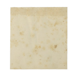 Antiquitätenfestgehaltenes Papier-Notepad aus den Notizblock