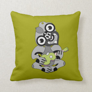 Aotearoa Hei Tiki mit grüner Ukulele Kissen