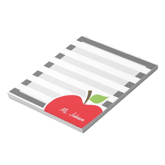 Apfel auf dunkelgrauen horizontalen Streifen Notizblock (Rotiert)