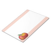 Apfelfrucht mit rosa Cartoon Notizblock (angewinkelt)