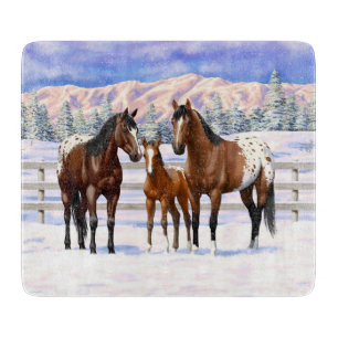 Appaloosa brauner Bucht Pferde im Schnee Schneidebrett